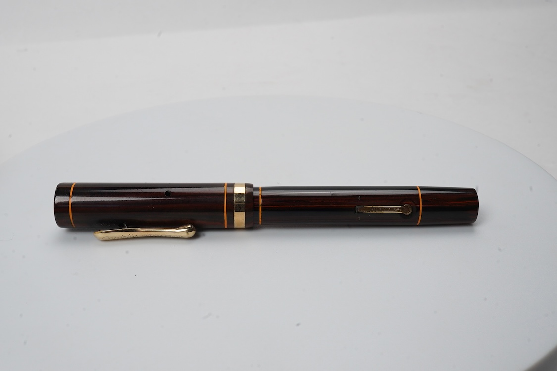 A Conklin Endura woodgrain lever filler fountain pen in near mint condition